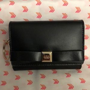 Kate Spade Black bifold wallet. In good condition.